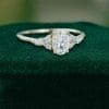 1 Carat Oval Cut Moissanite Engagement Ring with Classic Side Stones .(1)