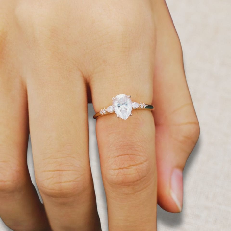 1.2ct Pear Cut Moissanite Engagement Ring • Vintage Rose Gold (1)