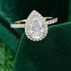 Classic Pear Shaped Moissanite Engagement Ring with Halo and Pavé Accents (1)
