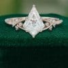 Elegant Kite Cut Moissanite Bridal Ring with Twisting Diamond Accents (3)