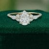 Elegant Pear Cut Moissanite Ring with Dazzling Side Accents (2)