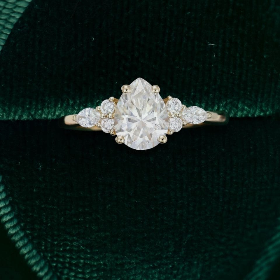 Elegant Pear Cut Moissanite Ring with Dazzling Side Accents (4)