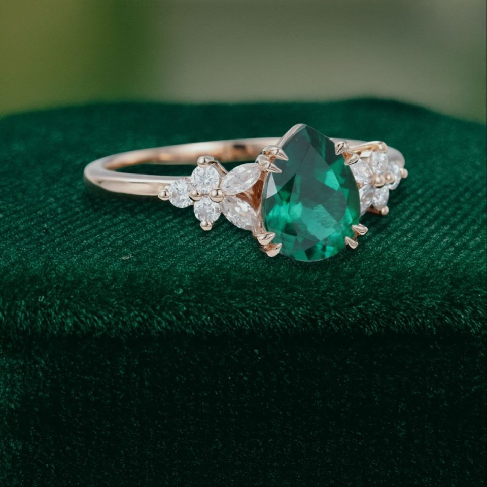 Elegant Pear Emerald Engagement Ring with Diamond Blossom Cluster Detailing (3)
