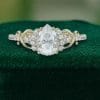 Elegant Pear Moissanite Ring with Infinity Twist Pavé Design (2)