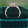 Elegant Pear Moissanite Ring with Infinity Twist Pavé Design (3)