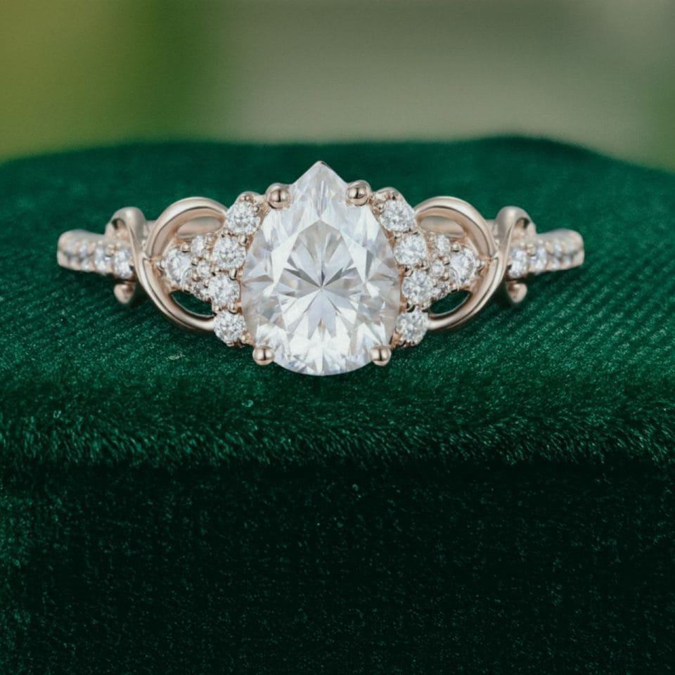 Elegant Pear Moissanite Ring with Infinity Twist Pavé Design (5)