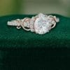 Elegant Pear Moissanite Ring with Infinity Twist Pavé Design (6)