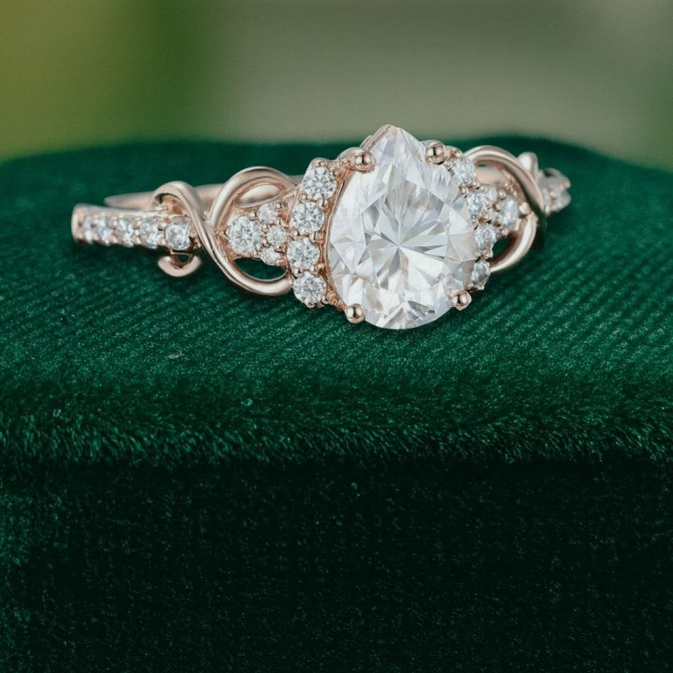 Elegant Pear Moissanite Ring with Infinity Twist Pavé Design (6)