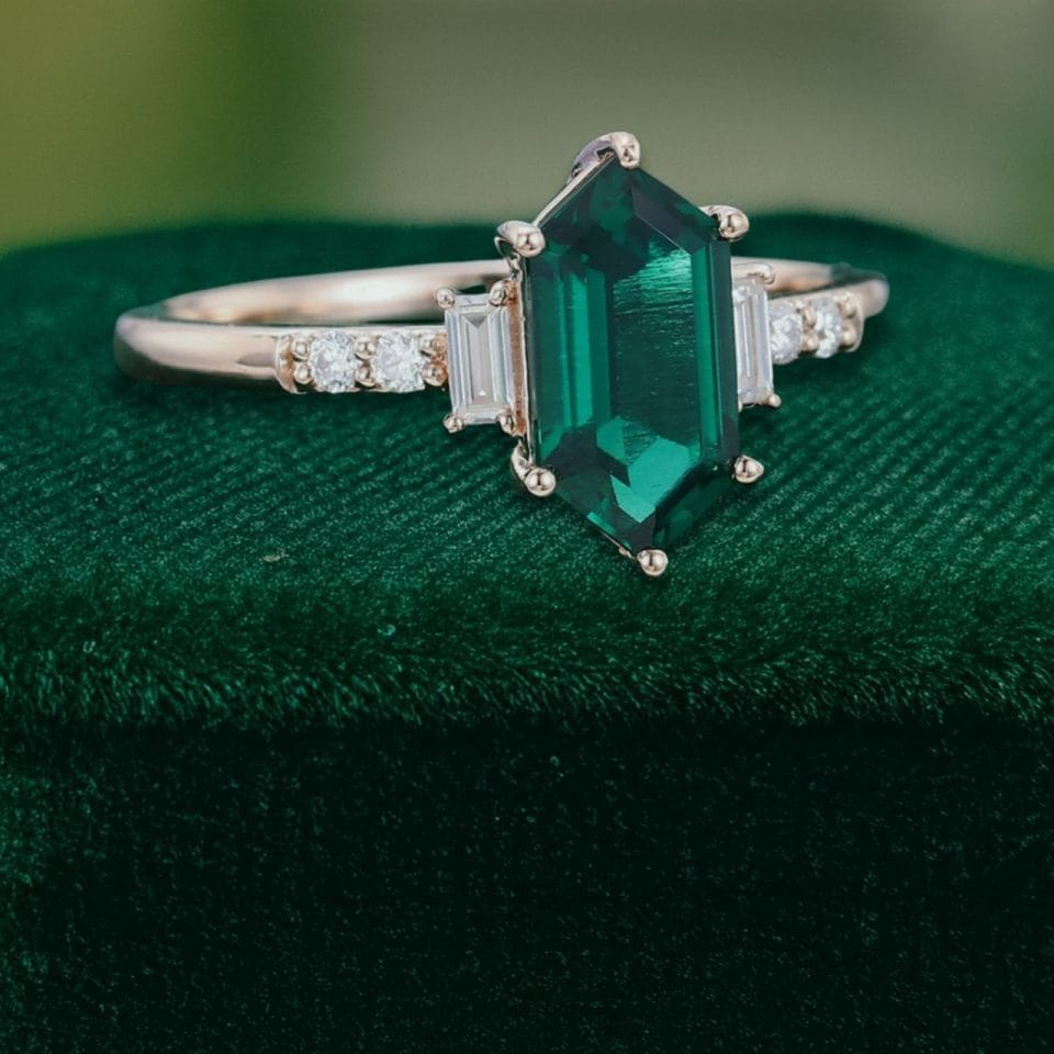 Elongated Hexagon Cut Emerald Engagement Ring with Baguette Accents (3)