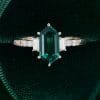 Elongated Hexagon Cut Emerald Engagement Ring with Baguette Accents (4)