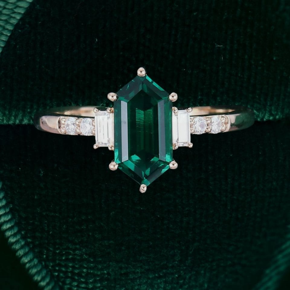 Elongated Hexagon Cut Emerald Engagement Ring with Baguette Accents (4)