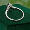 Elongated Hexagon Cut Emerald Engagement Ring with Baguette Accents (5)