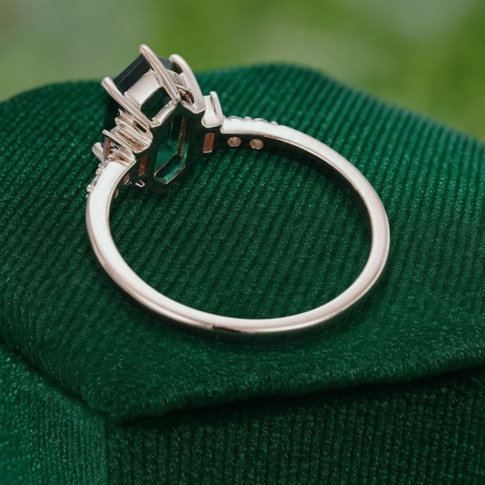 Elongated Hexagon Cut Emerald Engagement Ring with Baguette Accents (5)