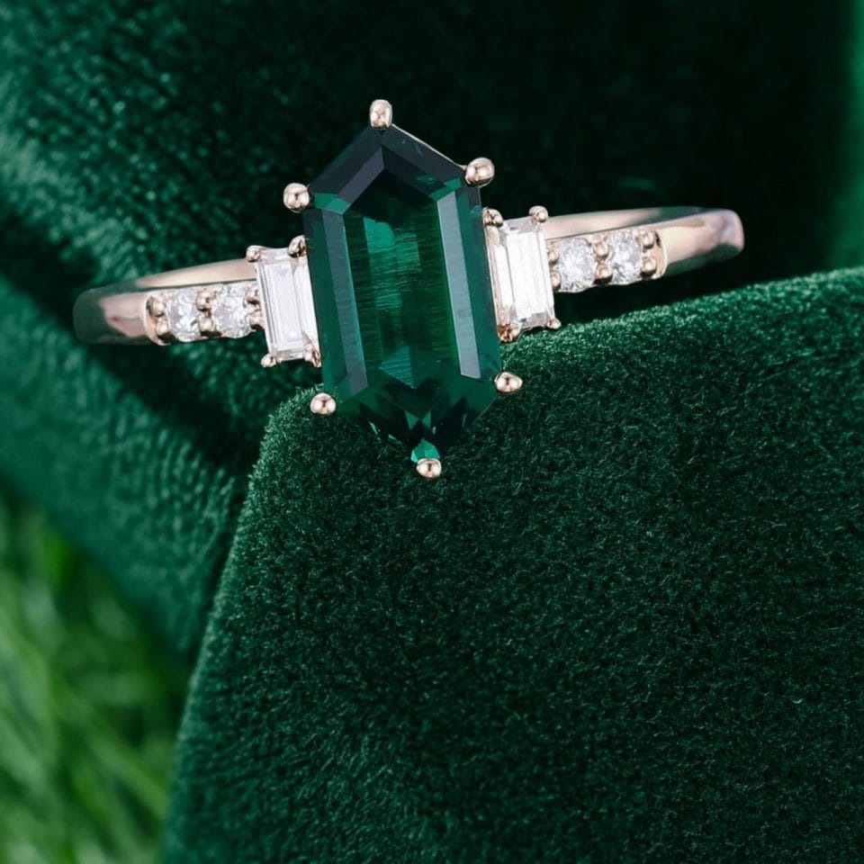 Elongated Hexagon Cut Emerald Engagement Ring with Baguette Accents (6)