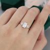 Emerald-Cut Moissanite Wings Engagement Ring in Rose Gold