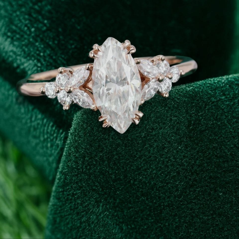 Marquise Cut Moissanite Engagement Ring with Double Claw Blossom Accent .0