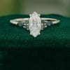 Marquise Cut Moissanite Ring with Vibrant Green Blue Sapphire Accents (1)