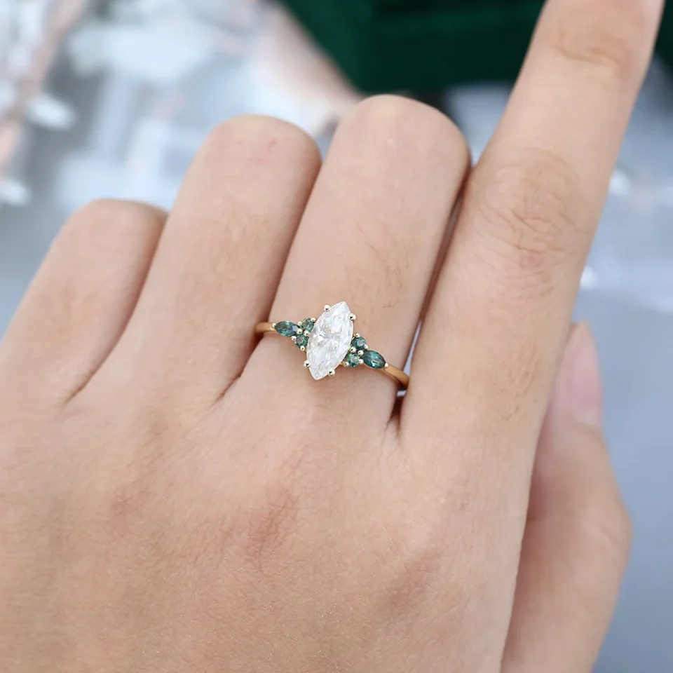 Marquise Cut Moissanite Ring with Vibrant Green Blue Sapphire Accents (1)