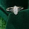 Marquise Cut Moissanite Ring with Vibrant Green Blue Sapphire Accents (5)