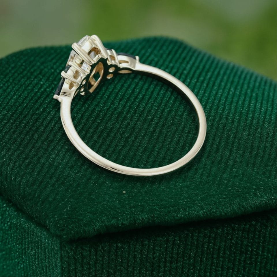 Marquise Cut Moissanite Ring with Vibrant Green Blue Sapphire Accents (6)
