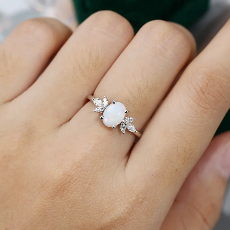 Oval Cut Opal Engagement Ring with Moissanite Wing Accents.0