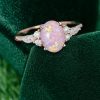 Oval Lab Pink Opal Promise Ring with Moissanite Accents (1)