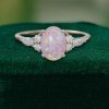 Oval Lab Pink Opal Promise Ring with Moissanite Accents (3)