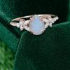 Pear Cut Ethiopian Natural Opal Engagement Ring with Moissanite Blossom (1)