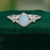 Pear Cut Ethiopian Natural Opal Engagement Ring with Moissanite Blossom (2)