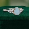 Pear Cut Ethiopian Natural Opal Engagement Ring with Moissanite Blossom (3)