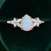 Pear Cut Ethiopian Natural Opal Engagement Ring with Moissanite Blossom (4)