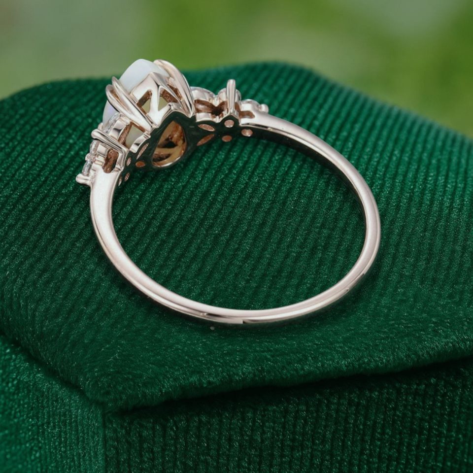 Pear Cut Ethiopian Natural Opal Engagement Ring with Moissanite Blossom (5)