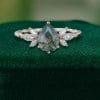 Pear Cut Moss Agate Bridal Ring Featuring Twisted Band and Marquise Accents (2)