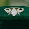 Pear-Shaped Moissanite Engagement Ring with Petal Cluster Accents (1)