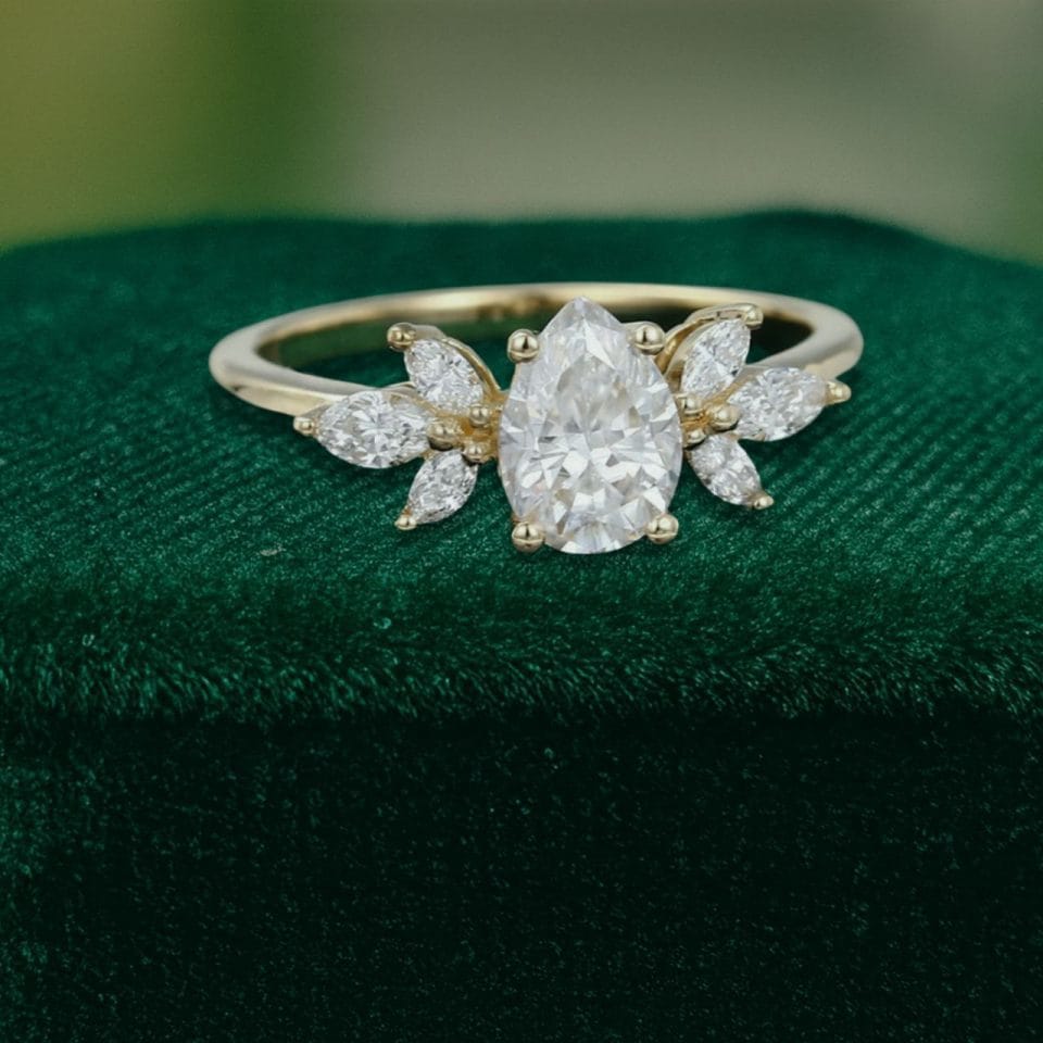 Pear-Shaped Moissanite Engagement Ring with Petal Cluster Accents (2)