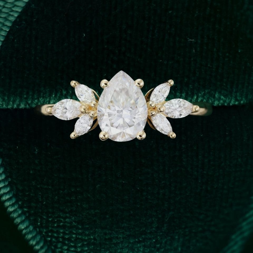 Pear-Shaped Moissanite Engagement Ring with Petal Cluster Accents (3)
