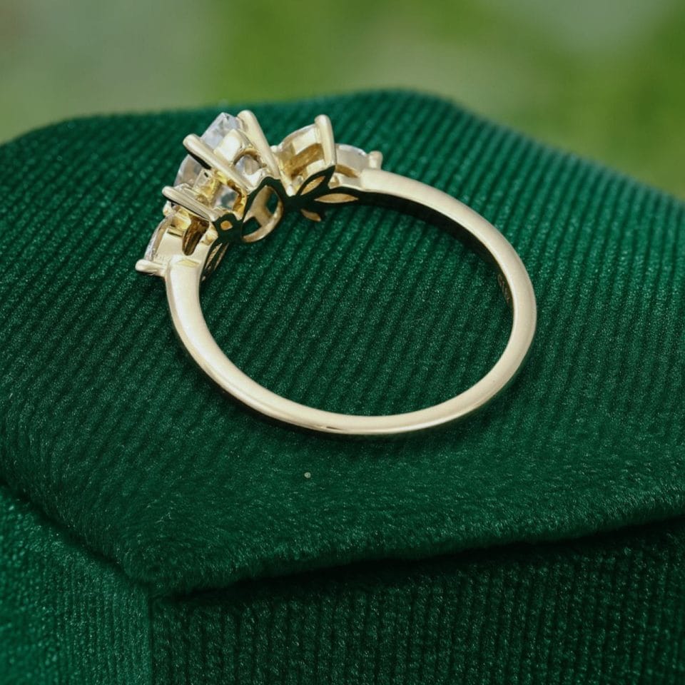 Pear-Shaped Moissanite Engagement Ring with Petal Cluster Accents (4)