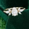Pear-Shaped Moissanite Engagement Ring with Petal Cluster Accents (5)