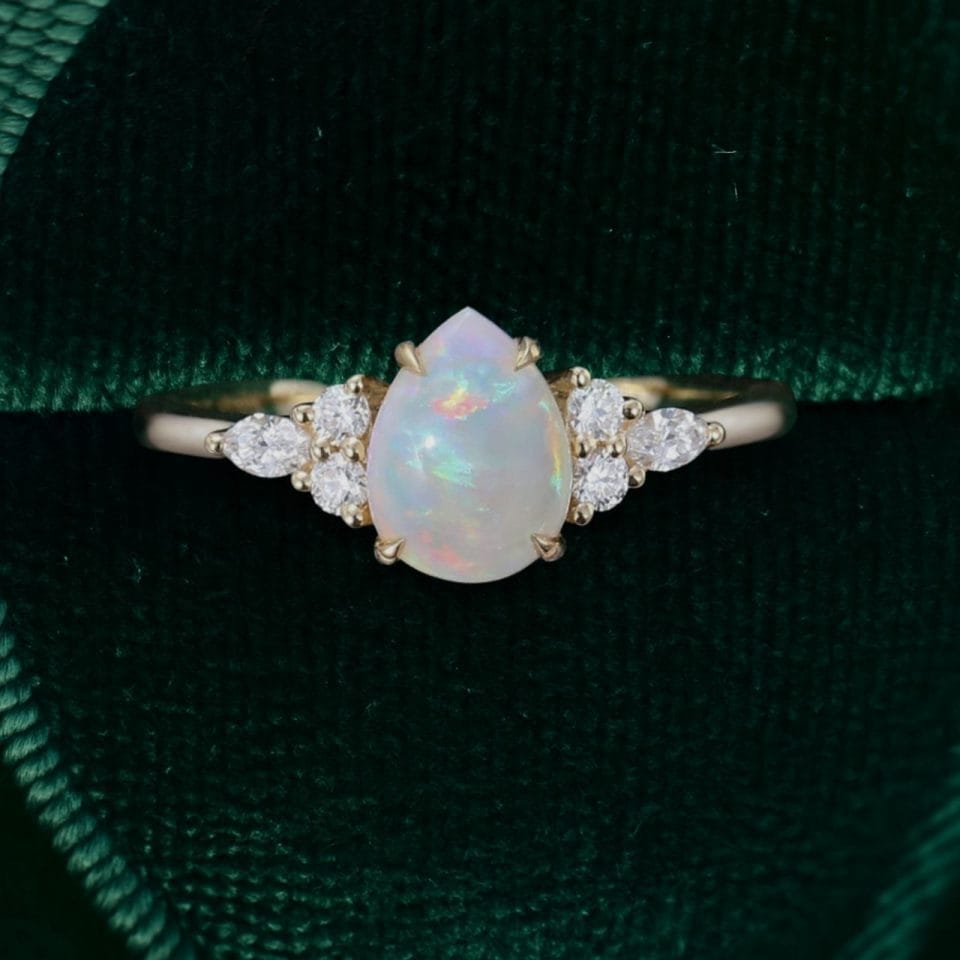 Pear Shaped Opal Engagement Ring with Dazzling Moissanite Cluster Accents (4)