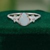 Pear Shaped Opal Engagement Ring – Moissanite Blossom Setting (1)