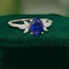 Pure Serenity Oval Cut Lab Sapphire Engagement Ring in Rose Gold Elegance (3)