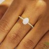 Refined Oval Opal Engagement Ring with Pavé-Set Half Band (2)