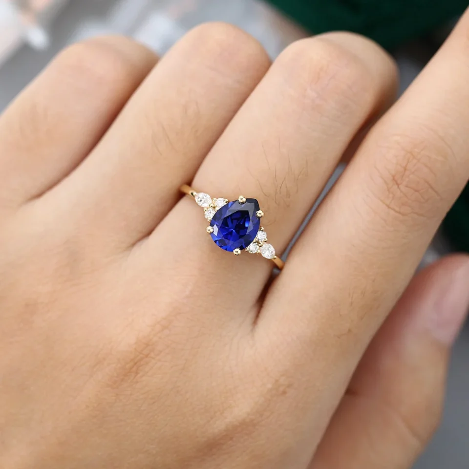 Romantic Pear Shaped Lab Sapphire Engagement Ring in Warm Yellow Gold.0