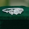 Snowdrift Round Cut Moissanite Engagement Ring with Symmetrical Cluster Design (2)