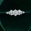 Snowdrift Round Cut Moissanite Engagement Ring with Symmetrical Cluster Design (3)