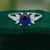 Sophisticated Pear Shaped Lab Sapphire Ring – White Gold Elegance (1)