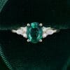 Timeless Oval Cut Emerald and Diamond Cluster Engagement Ring (4)