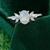Timeless Oval Natural Opal Engagement Ring – Moonstone Accented Design (1)