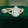 Timeless Pear Shaped Moissanite Halo Engagement Ring with Graceful Crossover Shank (4)