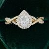 Timeless Pear Shaped Moissanite Halo Engagement Ring with Graceful Crossover Shank (5)